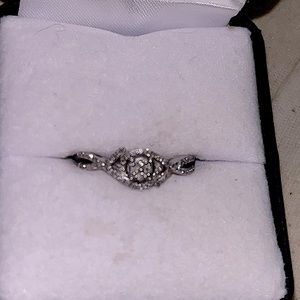 Silver engagement ring , size 7 or 8 missing one gem